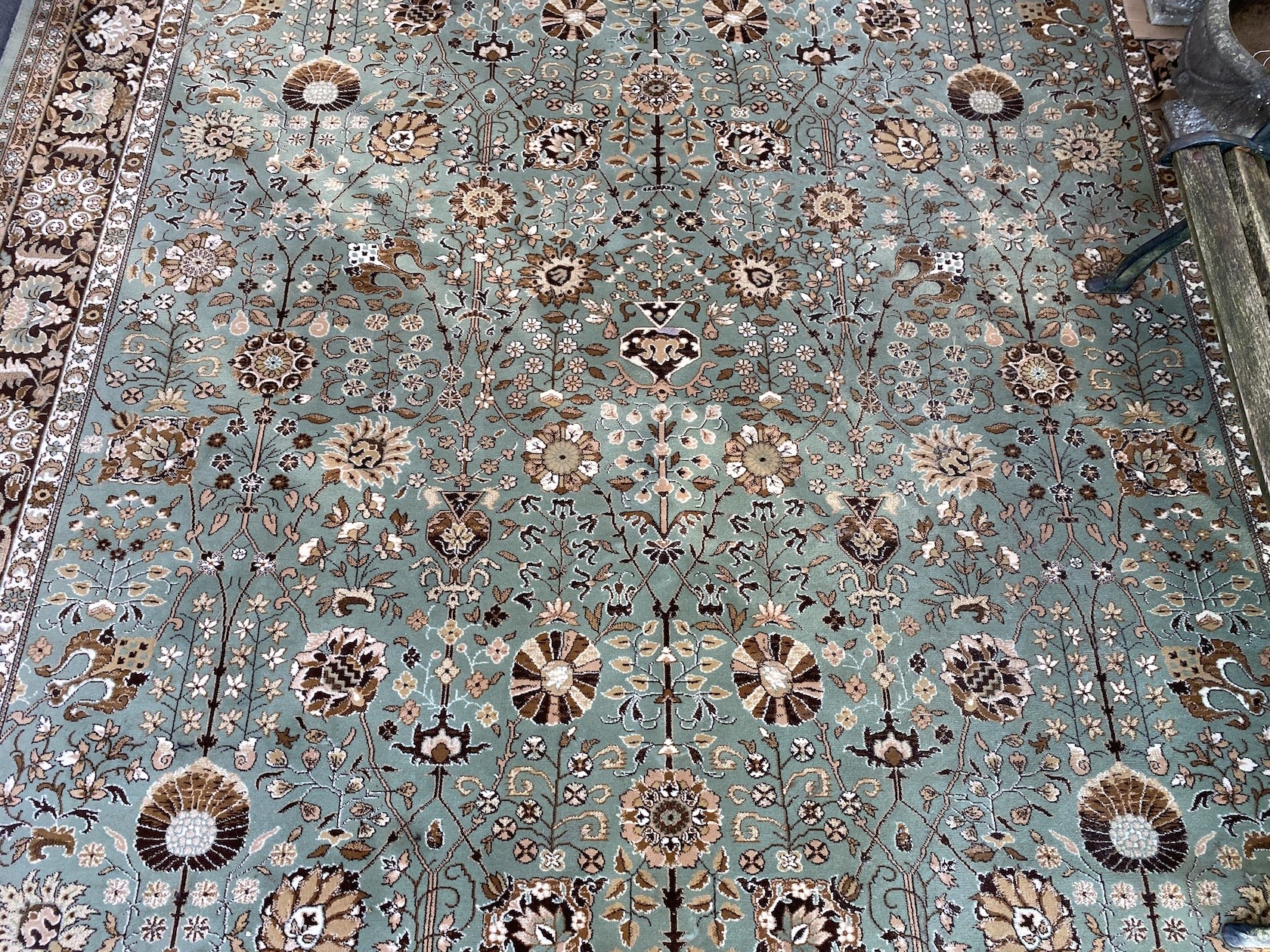 A Tabriz style green ground carpet, 400 x 300cm